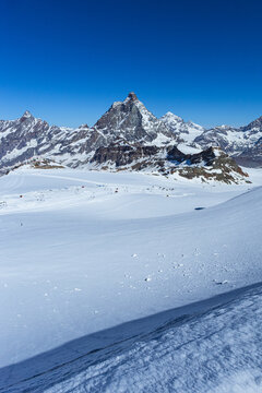 The matterhorn: one of the most iconic and famous mountains in the Alps. The Cima is surrounded by glaciers, rock faces and fantastic landscapes near the town of Cervinia, Italy - June 2021