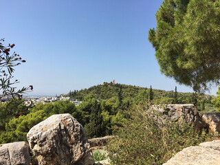 View of the Philopappos Monument on Mouseion Hill (Muse Hill), seen from the Athenian Acropolis in Athens, Greece.