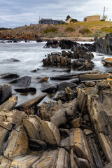 A portrait view long exposure of the rock formations along the coastline in Penneshaw Kangaroo Island South Australia on May 12th 2021