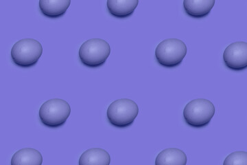 Purple color pattern eggs on lilac background. Happy Easter.