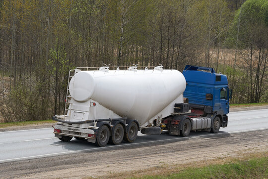 Ruzayevsky District, Mordovia, Russia - May 08, 2021: The truck with silo trailer on the intercity road.