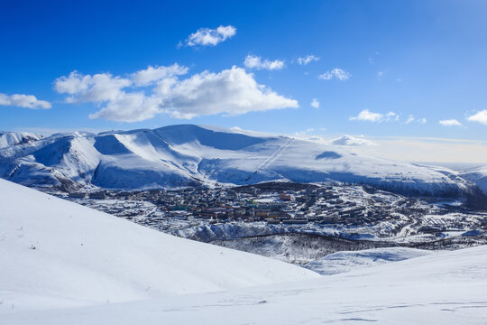 russian polar industrial city in winter chibiny mountains landscape and cloudscape