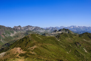chain of high rocky mountains and alpine meadows in caucasus mountains in Abkhazia