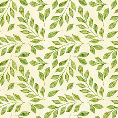 Fototapeta na wymiar Watercolor floral seamless pattern with green leaves and branches on light yellow background.