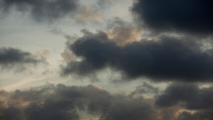 Naklejka na ściany i meble Clouds at sunset, weather concept