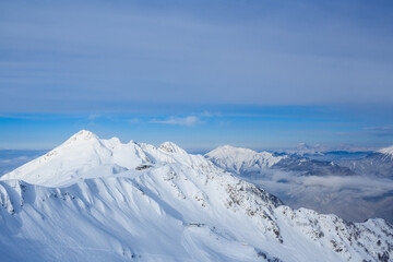 building on the top of mountains covered with snow in sochi Rosa Khutor ski resort
