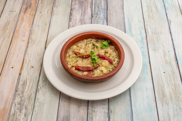 Typical Spanish tapa of garlic prawns fried in olive oil with spicy cayenne served in clay pot