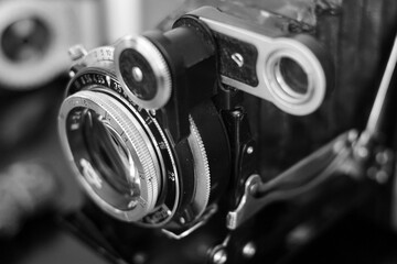 Fototapeta na wymiar Vintage lens on a rangefinder film camera