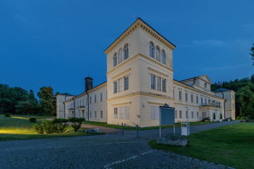 Naklejka premium State Castle Kynzvart at night - castle is located near the famous west Bohemian spa town Marianske Lazne (Marienbad) - Czech Republic