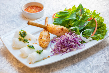 Grilled fish and fine rice vermicelli and vegetables