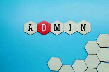 wooden hexagon with the word admin and a blue background