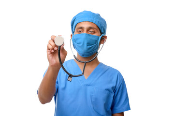 Young indian male Doctor holding stethoscope in hand on white ba