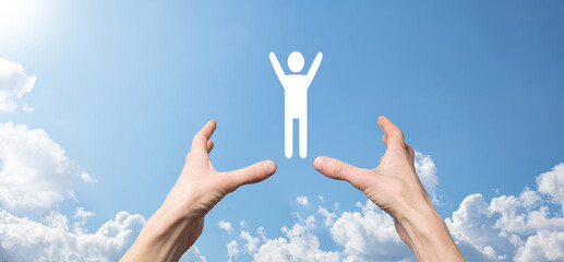 Hand on sky background holds human icon