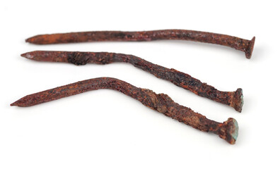 old steel nail with rust, corrosion, on white background	
