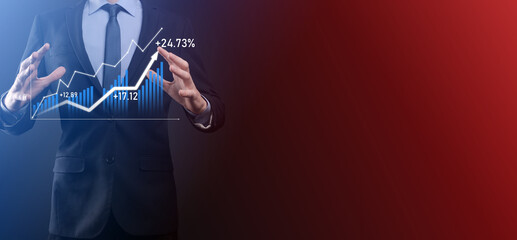 Businessman hold drawing on screen growing graph, arrow of positive growth icon.pointing at creative business chart with upward arrows.Financial, business growth concept.