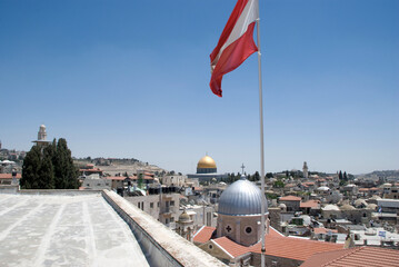 View over old town of Jerusalem with Austrian flag on Hospiz