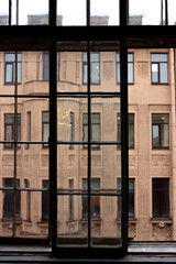 Old house through the window in SAINT-PETERSBUSR, Russia