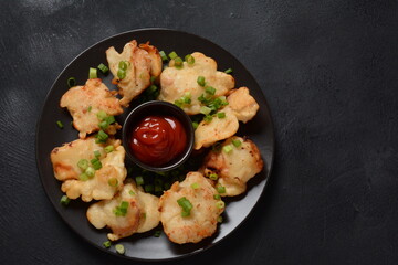 Golden crispy fried chicken fillet. Fried chicken pieces lightly battered, deep fried food