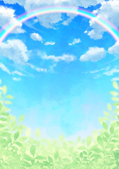 虹のかかった青空と雲と葉っぱ