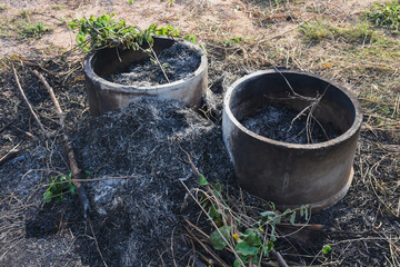 Trash at home in an outdoor compost bin to reduce waste.