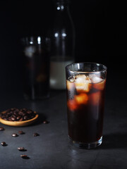 Cold coffee with ice in low key