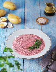 A plate with cold beetroot soup - national dish of Baltic region
