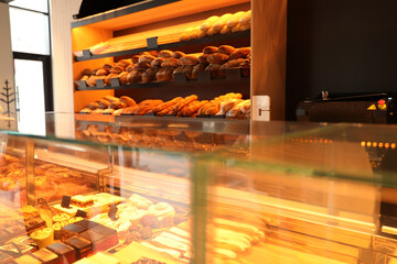 Fresh pastries on counter in bakery store