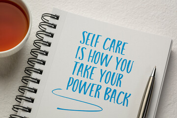 self care is how you take your power back - inspirational handwriting in a spiral notebook with a...