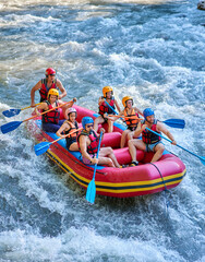 rafting on a stormy mountain river in summer - obrazy, fototapety, plakaty