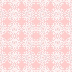 Beautiful seamless pattern with ornament from stylized flowers on light pink background. Textile print.