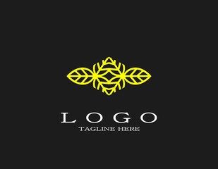 Elegant abstract logo with two leaves. Luxury logo with yellow lines or strokes. Nature and botanical.