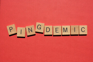 Pingdemic, buzzword, a play on the words ping and pandemic