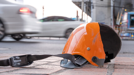 Broken helmet after Motorcycle bike accident on a traffic. 
Concept of safety transport ration
