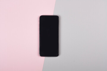 Smartphone on colorful background with copy space.modern and minimal style close up