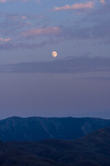 Portrait of the moon over the Sun Valley Idaho High Desert during Sunset
