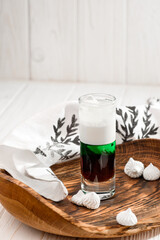 Colorful cocktail shots on a white background. Strong alcoholic drinks and tequila. High quality photo