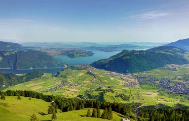 Foto op Canvas Magnificent panoramic aerial views of central Switzerland, mountains, villages and Lake Lucerne as you ascend the Cabrio cable car up Mount Stanserhorn in Switzerland. City of Stans. © leesle