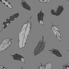 Seamless pattern with hand drawn doodle boho feathers. Monochrome Bohemian texture. On gray background.
