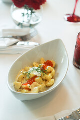 Gnocchi with cream and red caviar