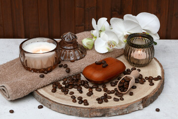 Fototapeta na wymiar Aroma candle with soap and coffee beans.