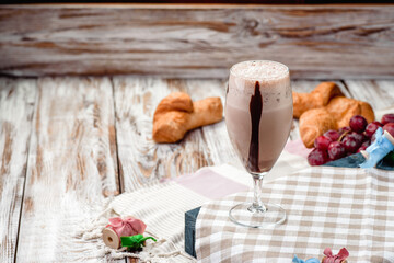 Chocolate milkshake in nice French composition. Space for text. High quality photo