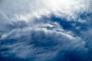 Background with clouds on blue sky.