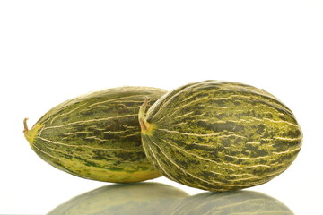 Two juicy ripe melons, close-up, isolated on white.