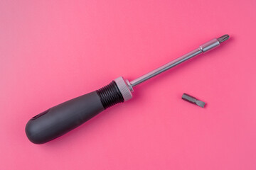 Black screwdriver with replaceable tip