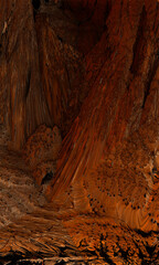 Brown texture cut blocks trench. Mining cliff of rough rock crash surface. Heavy grunge damage natural wall cave. Crack antique medieval marble front facade for design 3d rendering