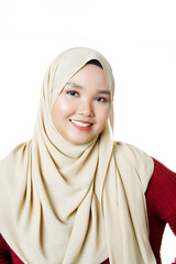 Asian muslim woman pointing her finger on isolated white background, advertising concept.
