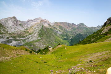 Fototapeta na wymiar Meadows, lakes, rivers, woods and mountains in the Aragonese Pyrenees bordering the French border