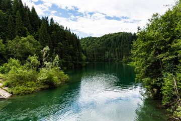 Scropoasa Lake, an artificial dam lake in the Bucegi Mountains, on the valley of the Ialomita River. Romania.