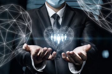 Businessman supports the heart in which customers are .