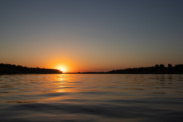 Red  sunset of the sun on the river
